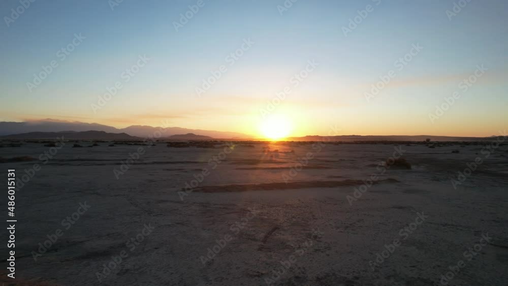 Low Altitude Aerial View of Desert Sunset El Mirage Basin, United States of America. Low Altitude Aerial View of Desert Sunset El Mirage Basin, United States of America.