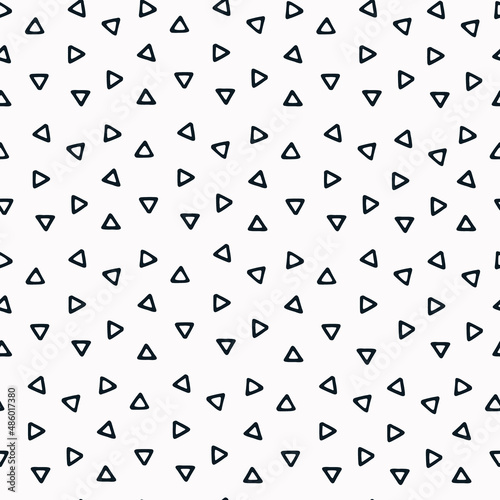Seamless geometric pattern with hand drawn uneven black small triangles on white background for surface design  craft  apparel and other design projects