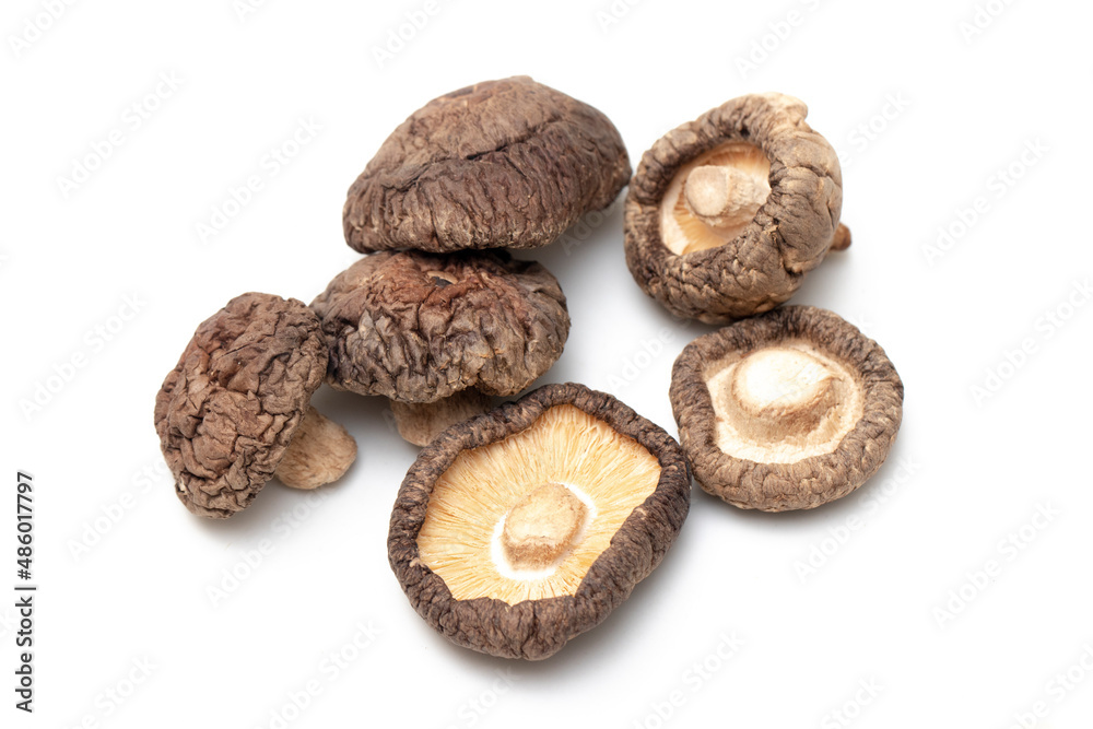 Dried shiitake mushrooms on isolated white background Dried shiitake mushrooms on isolated white background
