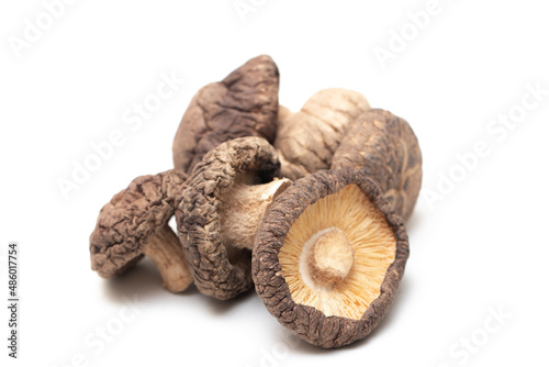 Dried shiitake mushrooms on isolated white background