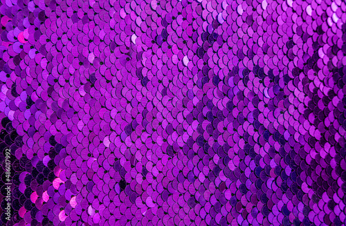 Colorful sequins sparkling background. Texture of sequins.