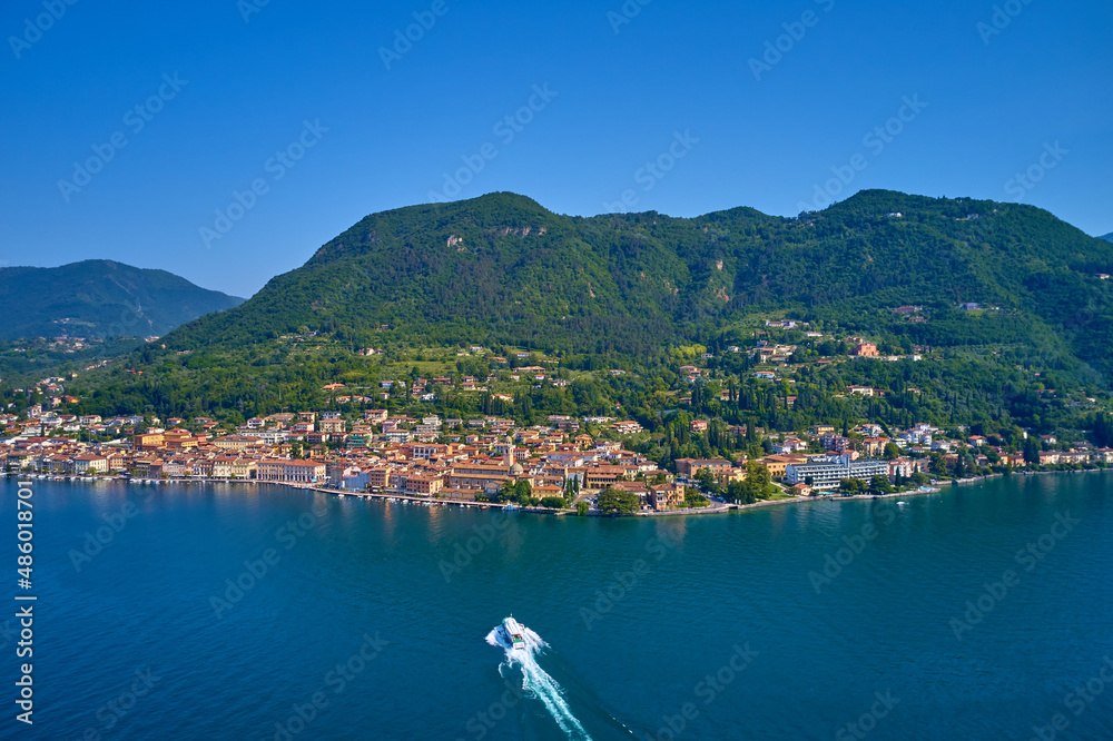 Salò on Garda Lake in the summer, little village in italy, view by Drone for your holidays in Italy.
