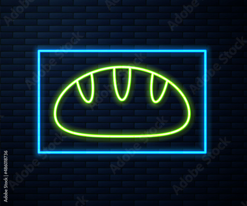 Glowing neon line Christian bread icon isolated on brick wall background. Religion and Christianity. Vector