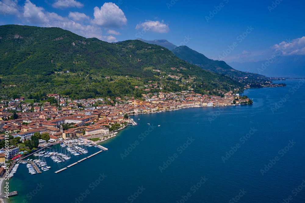 Panoramic view of the historic part of Salò on Lake Garda Italy. Tourist site on Lake Garda. Lake in the mountains of Italy. Aerial view of the town on Lake Garda.
