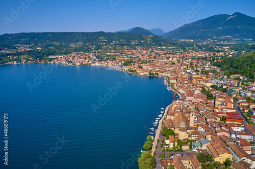 Panoramic view of the historic part of Salò on Lake Garda Italy. Tourist site on Lake Garda. Lake in the mountains of Italy. Aerial view of the town on Lake Garda.