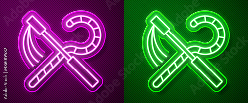 Glowing neon line Crook and flail icon isolated on purple and green background. Ancient Egypt symbol. Scepters of egypt. Vector