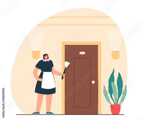 Hotel maid in uniform holding equipment for housekeeping. Woman standing near door flat vector illustration. Cleaning service, hospitality concept for banner, website design or landing web page
