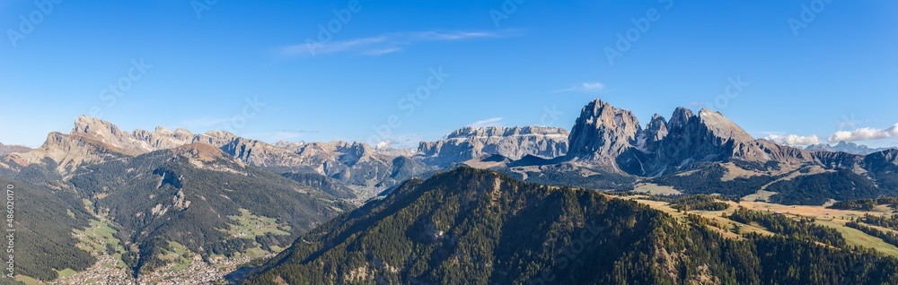Panoramic view of Langkofel Group mountains and valleys below. Seiser Alm, South Tyrol, Italy.