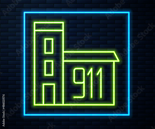 Glowing neon line Building of fire station icon isolated on brick wall background. Fire department building. Vector