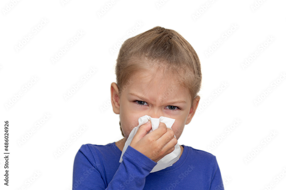 Isolated child blowing nose with too much pressure using napkin