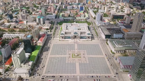 Mongolia, Ulaanbaatar. Government Palace, Chinggis Square ( SuheBator Square ), Aerial View Hyperlapse, Departure of the camera photo