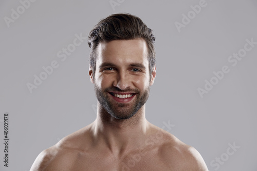 Portrait of young beautiful smiling caucasian man
