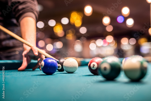 a group of young people came to play billiards and in the young hands was a cane and layers.
