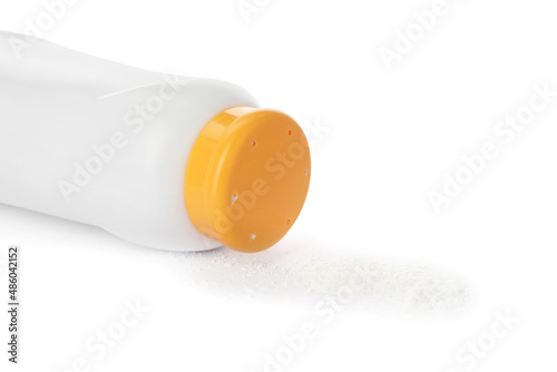 Bottle and scattered dusting powder on white background. Baby cosmetic product