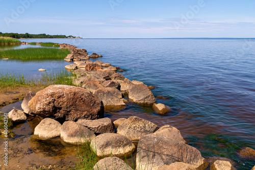 Coast of Finland bay with boulders and stones. Shelf of Baltic sea, gulf of Finland