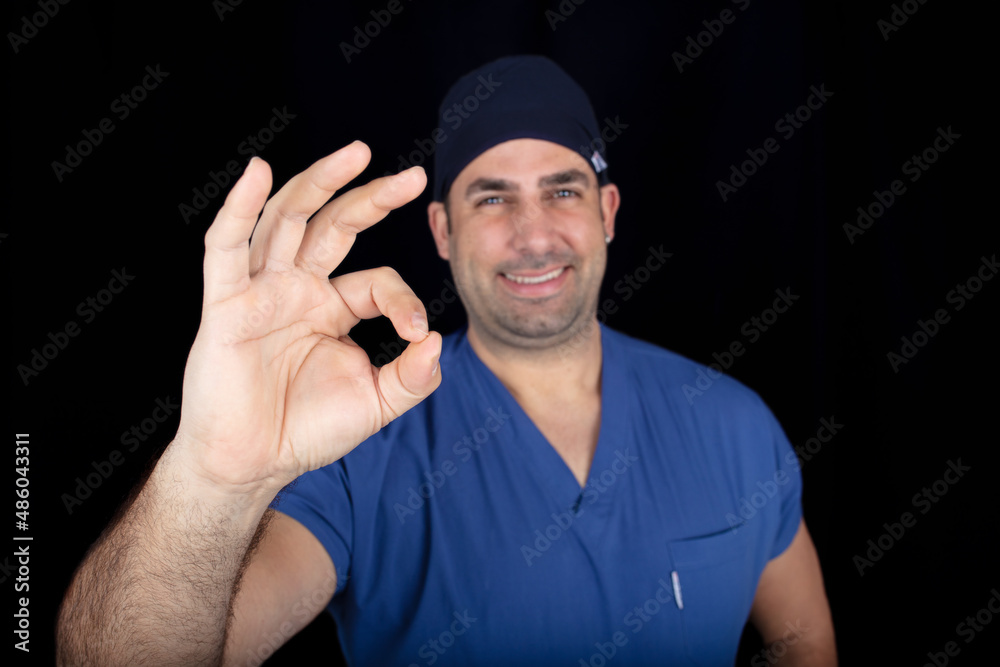 Naklejka premium Young male doctor on isolated background. Doctor medical and healthcare concept.