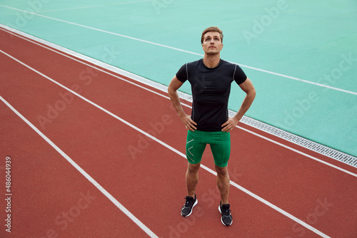 Sports man stretching before run on treadmill © Drobot Dean