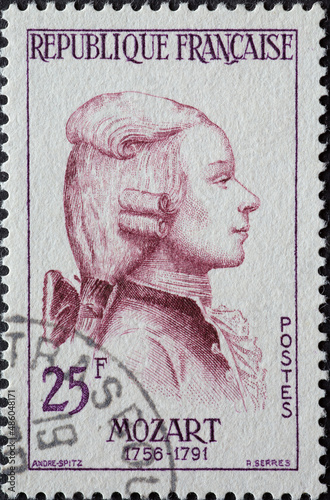 France - circa 1957: a postage stamp from France , showing the portrait of the musician Wolfgang Amadeus Mozart photo