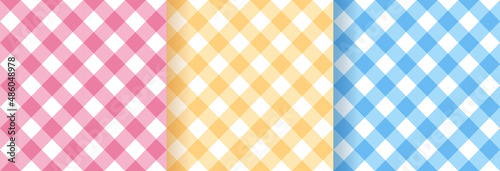 Checkered seamless patterns. Tablecloth vichy prints. Set of gingham backgrounds. Tartan textile grid. Plaid textures. Pastel retro wallpaper. Flannel backdrop. Vector illustration.