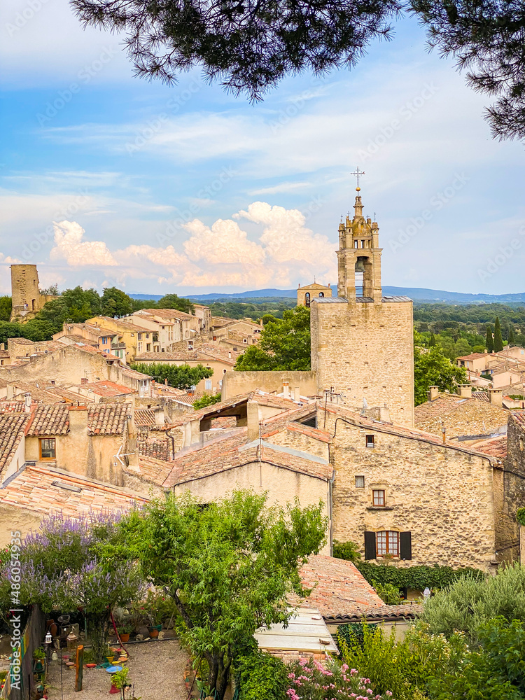 Village of Cucuron in the Luberon valley with a view on the clock tower in Provence, France