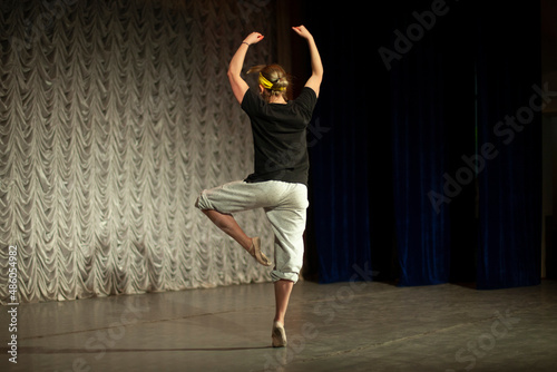 Dancer on stage. Ballet teacher. Expression of emotions in motion. Choreography lesson.