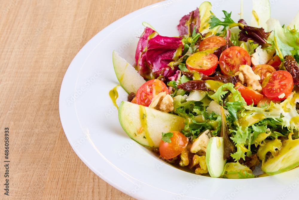 Plate of salad with apple Plate of salad with apple