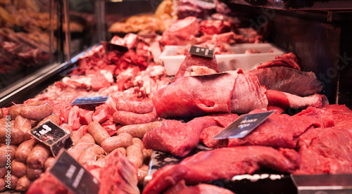 pork, beef, tenderloin, meatballs, entrecote, ham, carbonate in refrigerator on market counter