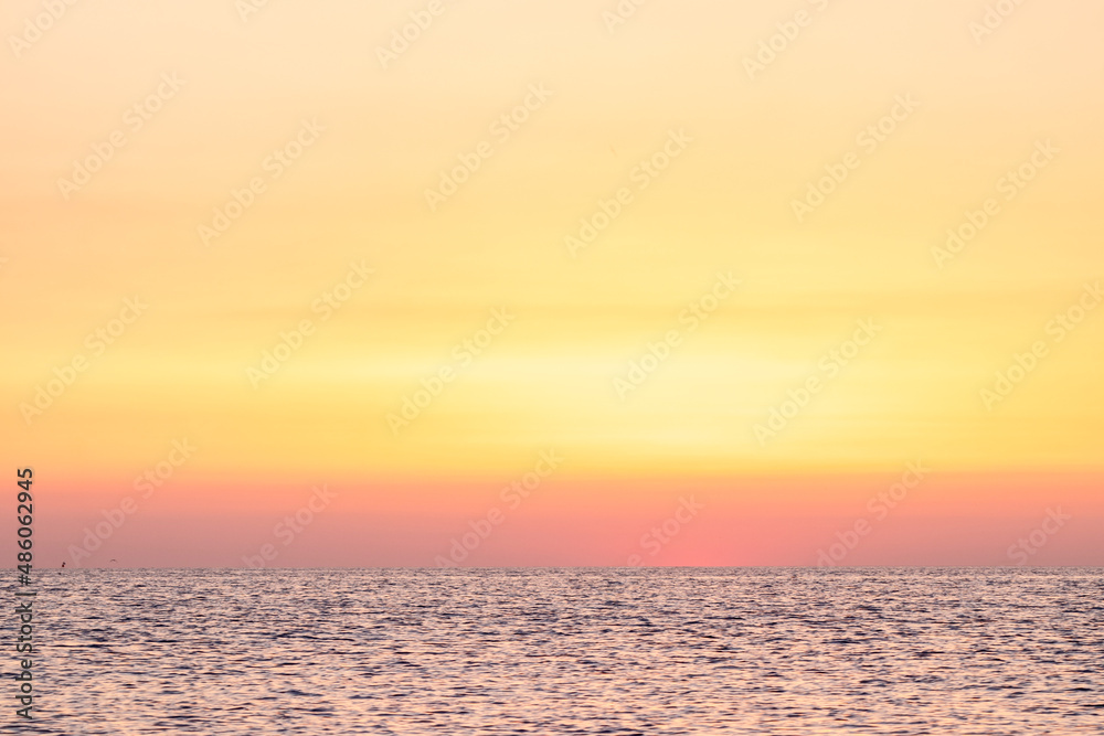 sun rising at dawn over the mediterranean sea on the costa brava