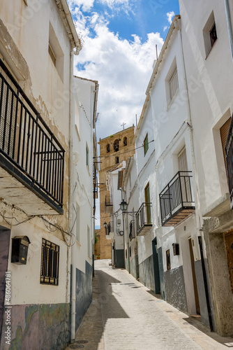 Homes. Alhama de Granada, Andalusia, Spain. Beautiful and interesting travel destination in the warm Southern region. Public street view. © lightcaptured