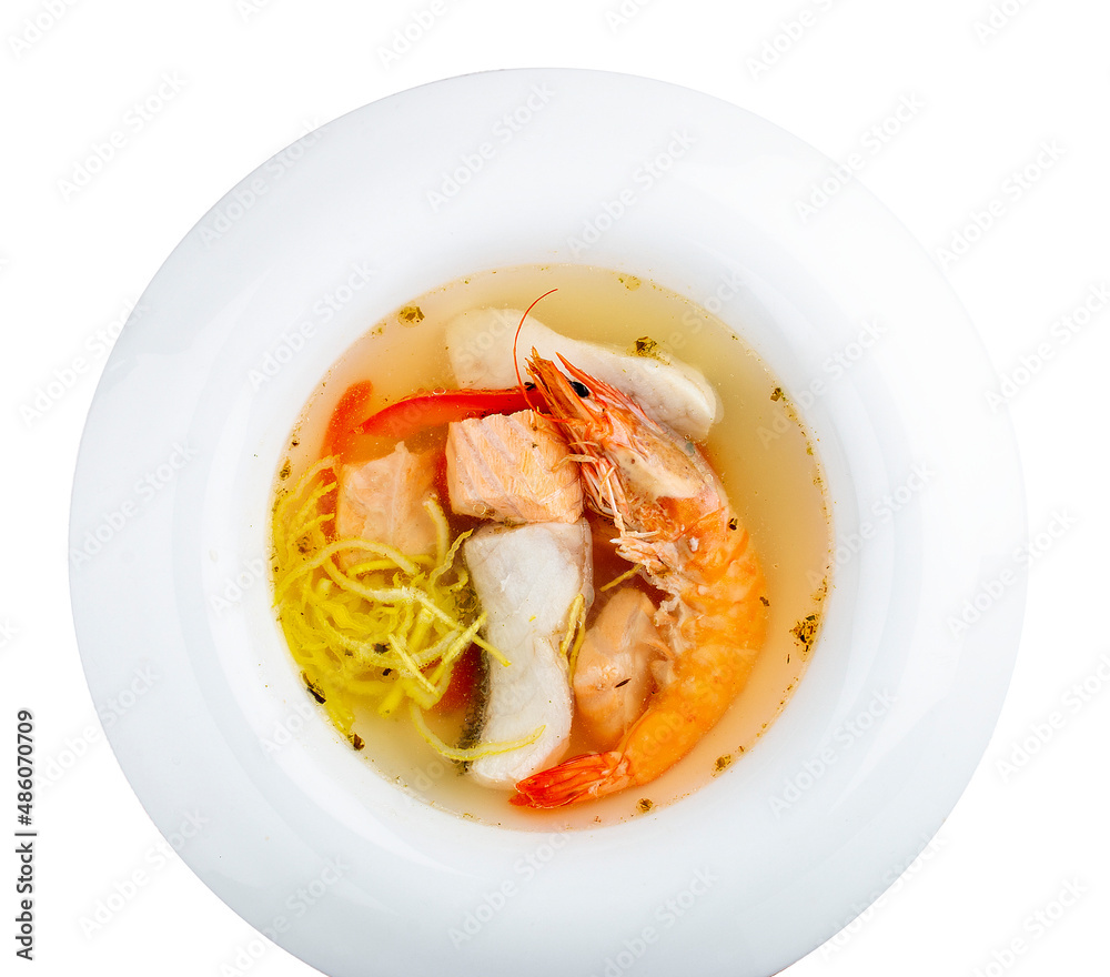 Fish soup with salmon, perch and king prawns. Top view Fish soup with salmon, perch and king prawns. Top view