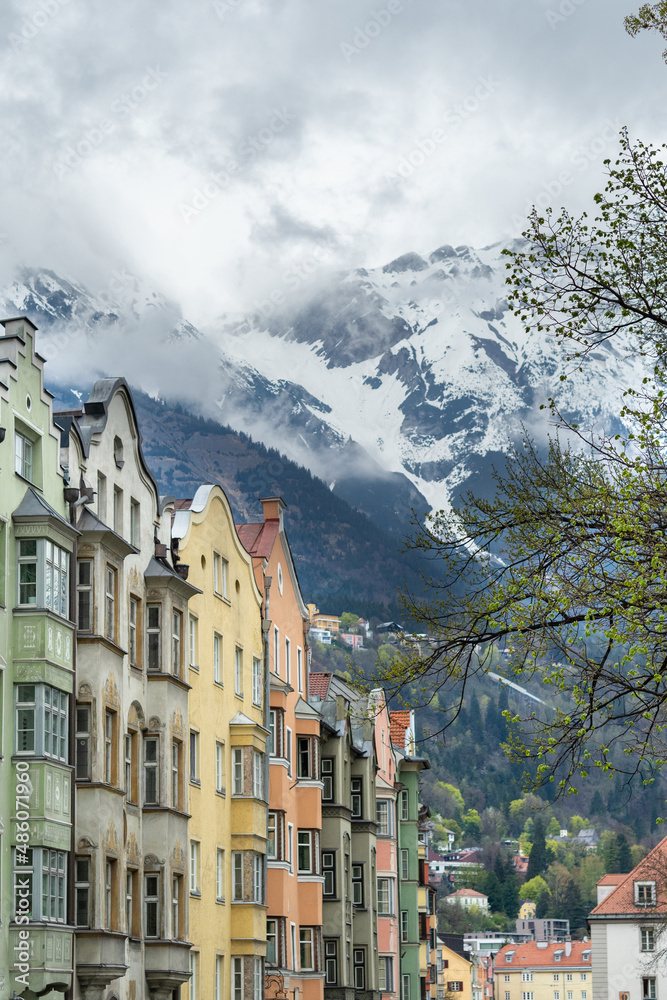 Naklejka premium Innsbruck, Austria - April 16th 2018: Colorful historic facades in the city centre.