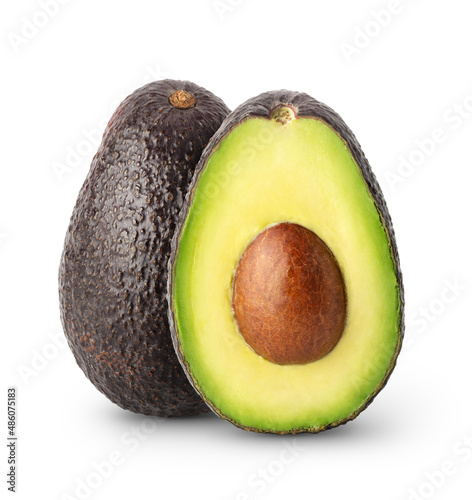 Isolated avocados. Whole and a half of black avocado fruits isolated on white background with clipping path