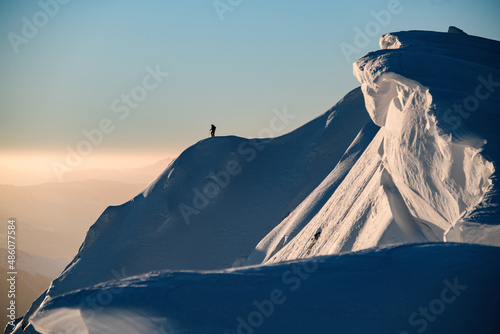 Obraz na płótnie Awesome scenic view of the beautiful relief snow-covered mountain slope and free