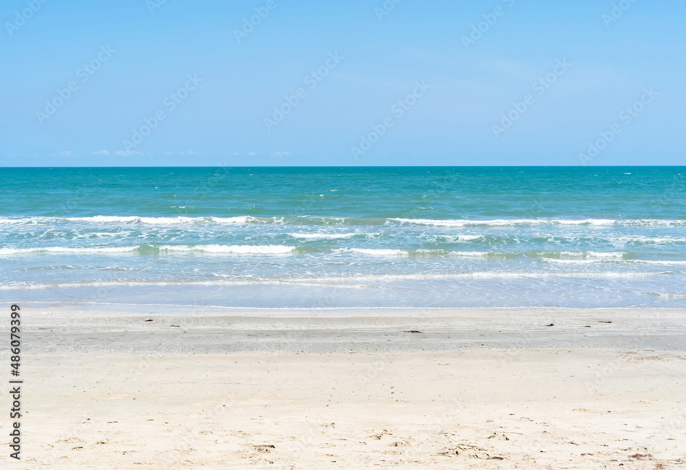 Beach and bright blue sky in summer, Thailand.