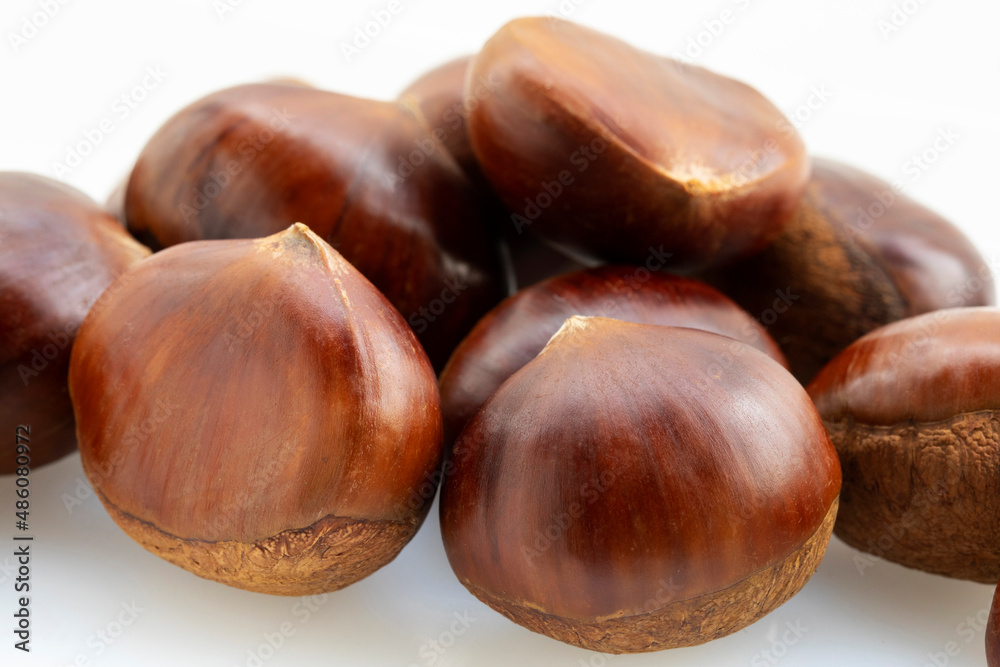 Autumn delicacies, chestnuts, white, white background Autumn delicacies, chestnuts, white, white background