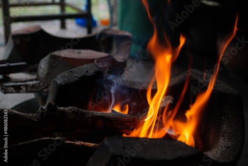 abstract blur of flames, fire burning wood in stove