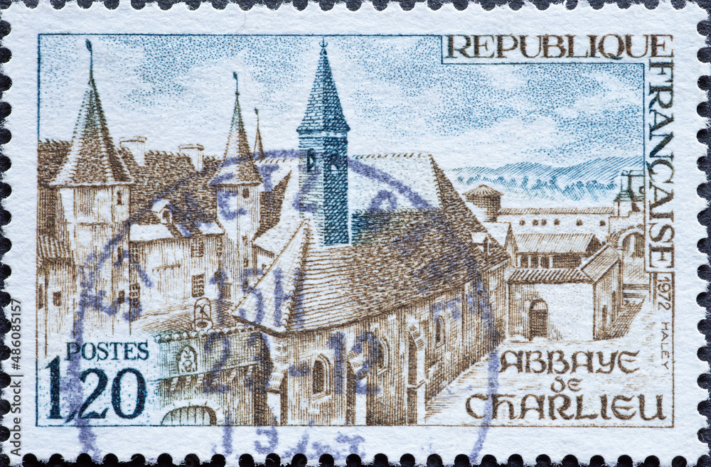 France - circa 1972: a postage stamp from France , showing the buildings of Charlieu Abbey