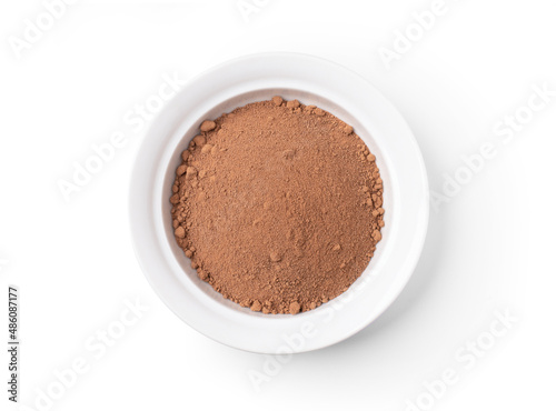 Cocoa powder in white bowl isolated on white background with clipping path, top view, flat lay.