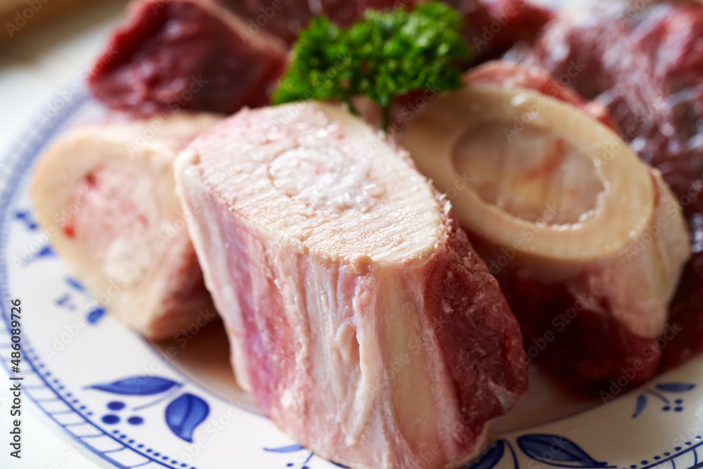 Close up of beef marrow bones and meat - ingredient for bone broth Close up of beef marrow bones and meat - ingredient for bone broth