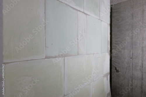 wall made of white gypsum partition blocks, an interior partition. © NEZNAEV