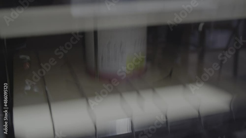 Tinting of paint in vibrating shakers. 