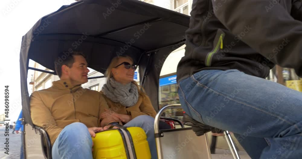 Tourists Riding Cycle Rickshaw in Tallinn Stock ビデオ | Adobe Stock