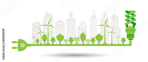Ecological city and environment conservation. Energy-saving lamp symbol with plug electric. Silhouette green city with renewable energy sources.
