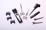 Barber clipper,scissors for haircuts,nozzles for haircuts on a white background.Free space for text.Barber tool.Copy space.