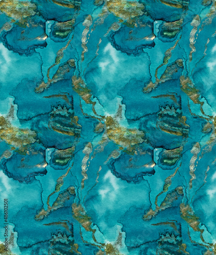 Watercolor seamless pattern of waves of blue-green teal paint wash with golden foil and gold paint as marbling