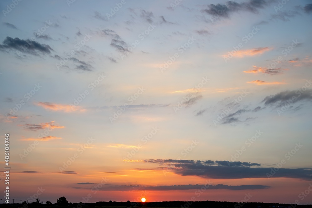 Sunset in the clouds sky.