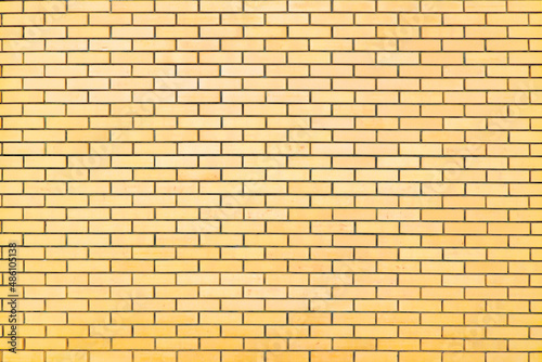 Yellow brick wall pattern background