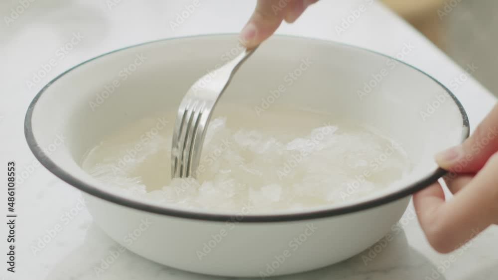 Unrecognizable person preparing mint sorbet Unrecognizable person preparing mint sorbet