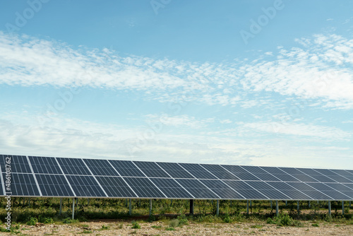 Field of solar panels to generate green and sustainable energy for the industries in the area.