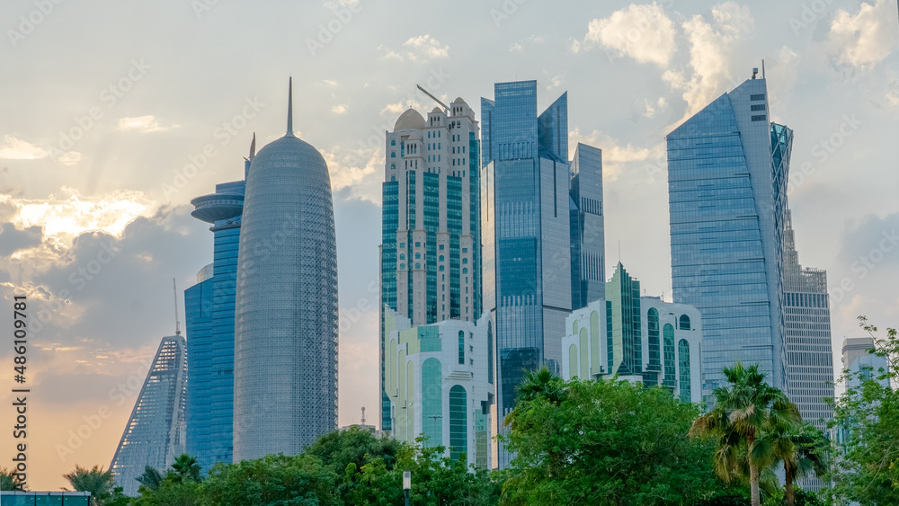 The skyline of Doha city center during evening, Qatar The skyline of Doha city center during evening, Qatar